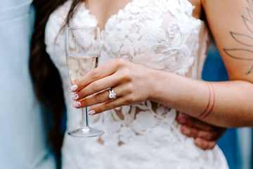 a bride wearing the being rings set by Kimjoux London